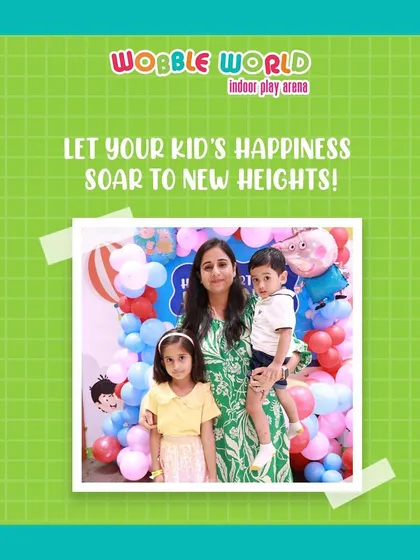 A mother and her children posing in front of a vibrant balloon wall. These are the happy, colorful memories we help create.