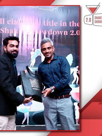 One of our partners presenting a gift to a participant, highlighting the community support for the event.