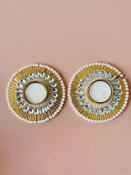 A close-up of the beautiful pearl and crystal T-light holders. These decorative pieces add a touch of sparkle to my festive hampers.