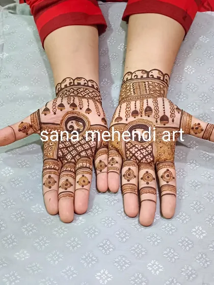 A unique design with yin-yang symbols, swastikas, and jhumka motifs.