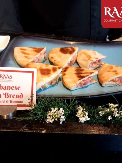 Bringing a taste of the Middle East to your party with my Lebanese Pita Bread filled with falafel and hummus. It's a light yet satisfying appetizer, perfect for mingling.