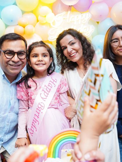 A family celebrates their daughter's 6th birthday with a "Rainbow High" theme. We love when clients return and we can create a new magical world for them.