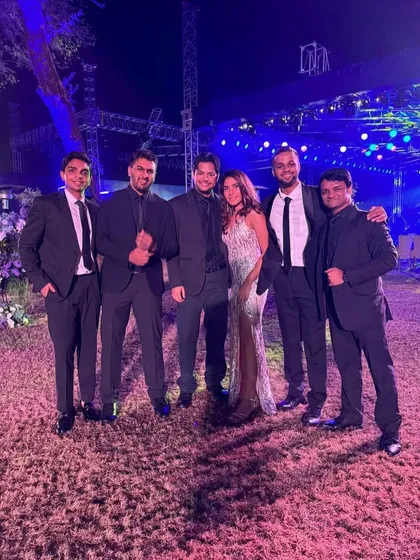 The whole crew together after another amazing adventure. This was taken right after a performance, still buzzing from the energy of the crowd.