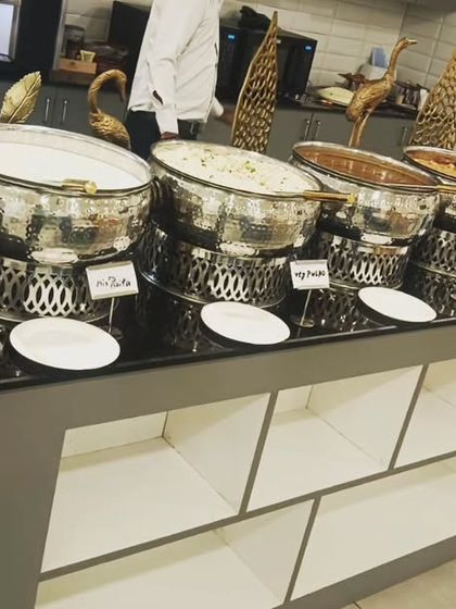 A full view of the buffet spread for 110 guests at ChargePoint Technologies Pvt Ltd. The setup includes a variety of main courses and sides to cater to diverse tastes.
