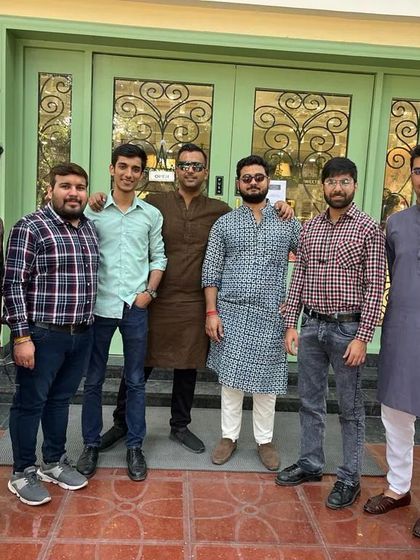 Our team dressed in traditional attire for a celebration. We are a diverse group united by our profession.