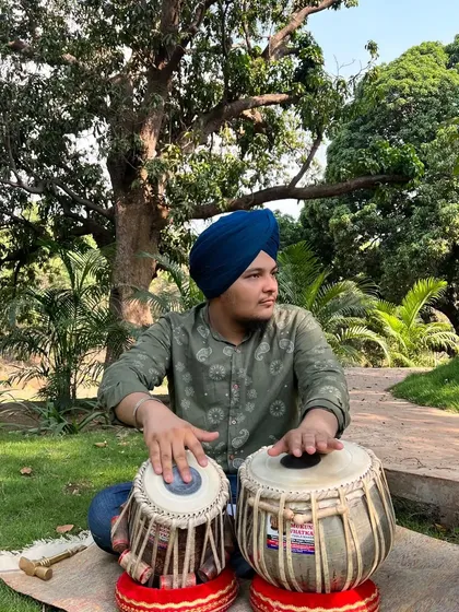 Enjoying a moment of peace and music in nature. The love of nature and art are languages that connect us all.