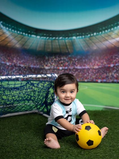 He's got the ball! This action shot captures a playful moment from the session.