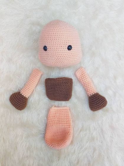 These are the separate parts of the platypus toy before I stitched them all together. You can see the head, body, arms, and feet, all created individually.
