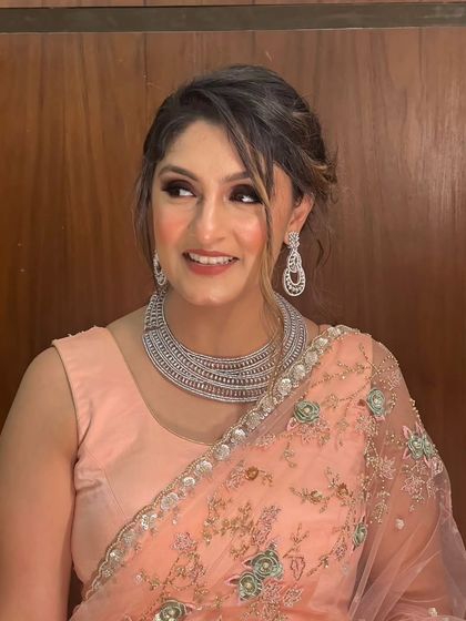 A glamorous evening look for a Mehendi night. The smokey eye and diamond jewelry create a sophisticated and modern style.