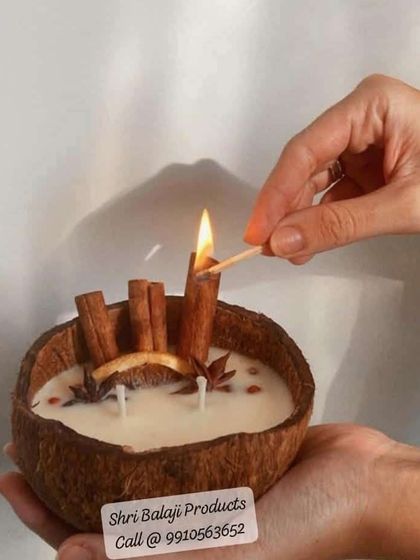 An example of a beautifully decorated coconut shell candle using cinnamon sticks and star anise. I supply all these decorative spices to help you create stunning, aromatic candles.