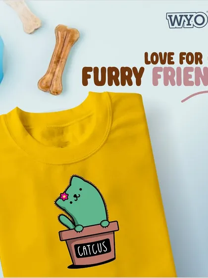 A punny and cute "Catcus" t-shirt, featuring a cat sitting in a flowerpot. Perfect for those who love both cats and plants.