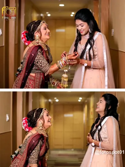 A candid moment of shared laughter between the bride and her sister or best friend. These are the unscripted memories that make a wedding album special.