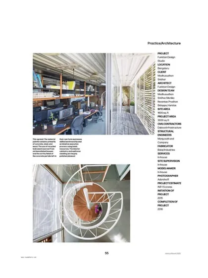 The magazine spread details the project credits and showcases interior views of the studio, including the open-plan workspace and the sculptural spiral staircase.