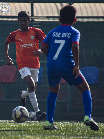 A duel for the ball shows the determination and spirit our players bring to every game.