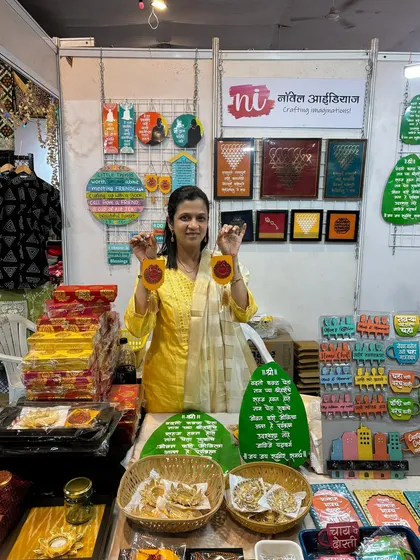 Day 2 at the Pandit Farms exhibition in Pune. Here I am, holding up some of my festive creations for Diwali.