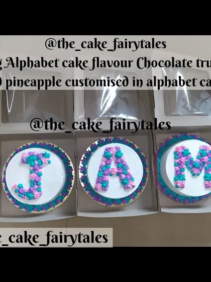 A top-down view of the 3kg alphabet cakes in their boxes, ready for delivery.