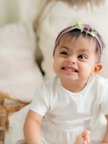 The cutest, cheesiest grin. This little girl's happy expression is what makes my job so rewarding.