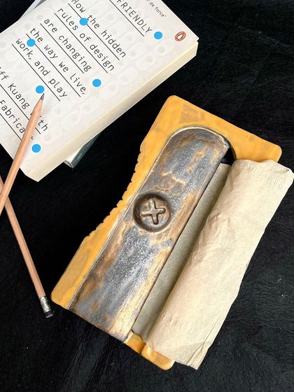 Another angle of our ceramic sharpener tissue box, because we're obsessed. It sits in the studio and confuses everyone who asks for a tissue, which we find hilarious.