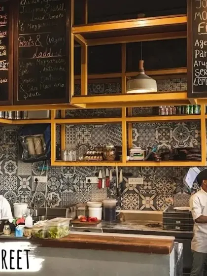 A look at where it all began: our first outlet on Church Street. The open kitchen, chalkboard menus, and vibrant tiles set the tone for the Brik Oven experience.