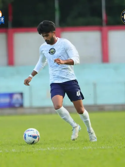 A player in possession, demonstrating the calm and composed approach we value.
