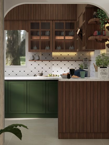 A view into the green and wood kitchen through the arched entryway, showing how the different materials and textures come together to create a warm and inviting space.