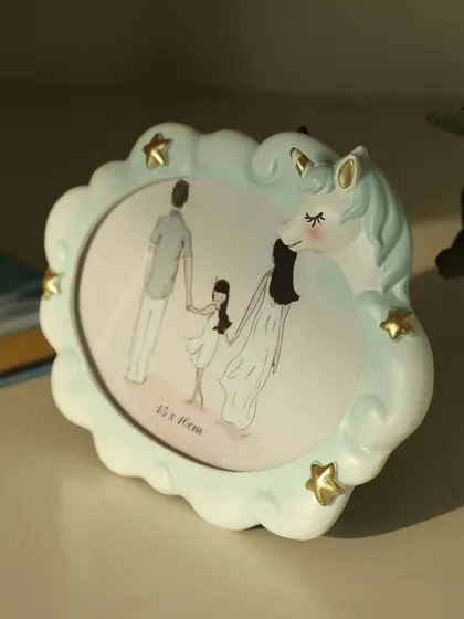 This dreamy unicorn photo frame, with its pastel colors and starry accents, is designed to hold the most magical moments. It adds a touch of enchantment to any child's room.