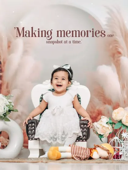 Making memories one snapshot at a time. This happy baby girl is all smiles during her first birthday photoshoot in our beautifully styled studio.
