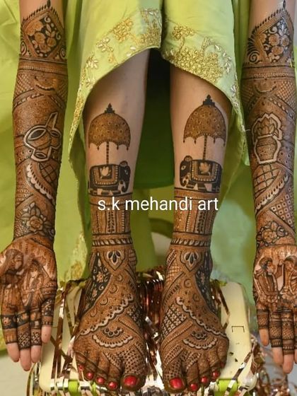 A complete bridal mehendi package with matching hands and feet. The leg design features royal elephants, complementing the couple portraits on the hands.