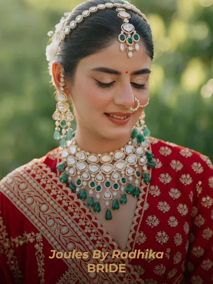 A vision in red and emerald. This is one of my real brides, looking absolutely radiant on her special day. Her bespoke polki and emerald bead necklace set was customized to complement her bridal lehenga and her personal style.