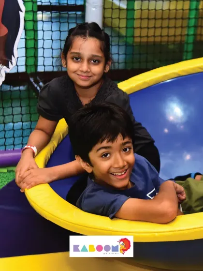 All smiles on the spinner! This ride is perfect for a dizzying dose of fun with friends.