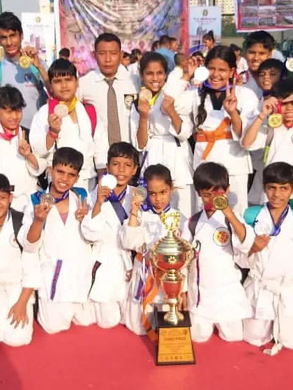Our success starts early. Here is our junior team after winning the top position at a school games championship. We build a strong foundation in young fighters, preparing them for a long and successful competitive career.