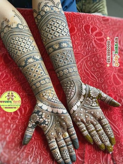 This design features a mix of geometric patterns and delicate floral work. The contrast between the dark-filled areas and the fine lines creates a striking 3D effect.