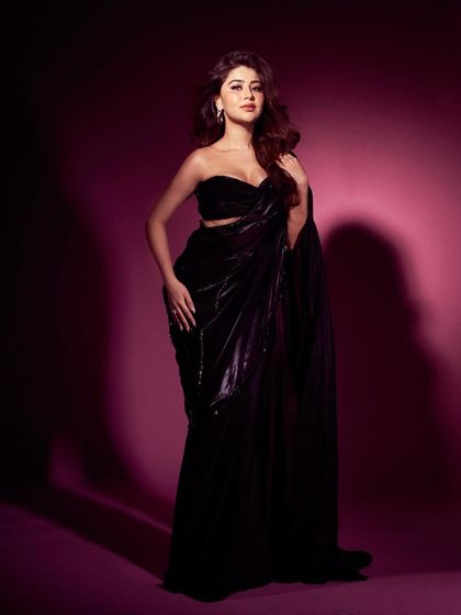 The full look for Aditi Bhatia at the Lokmat Style Awards. The fluid, sparkling fabric of the saree catches the light beautifully, making it a perfect choice for a glamorous evening.