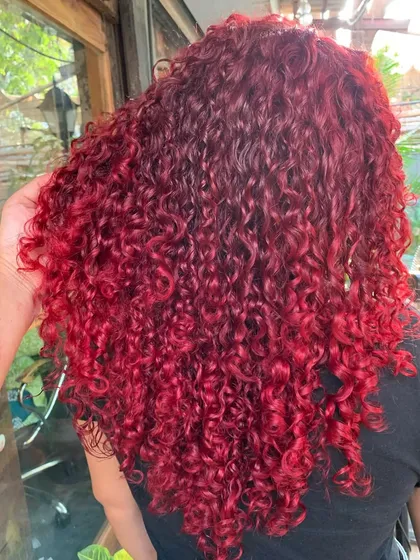 Another angle of the fiery red curls. The non-bleach color is so vibrant and makes the curls pop.