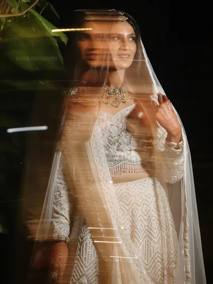 An experimental bridal portrait using a slow shutter speed to create a beautiful motion blur effect.