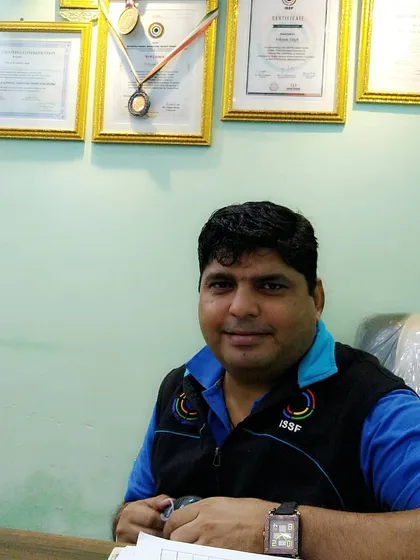 As an ISSF 'B' Course Judge and NRAI certified coach, I ensure our training programs and facilities meet international standards. My certifications are always on display at the academy to assure students of our professional commitment.