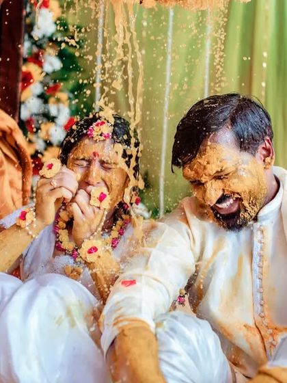 A hilarious and candid moment from a Haldi ceremony. We capture the real, unscripted fun that makes your wedding unique.