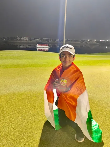 Vedaansh proudly drapes the Indian flag over his shoulders after his runner-up finish at the UAE Championship.