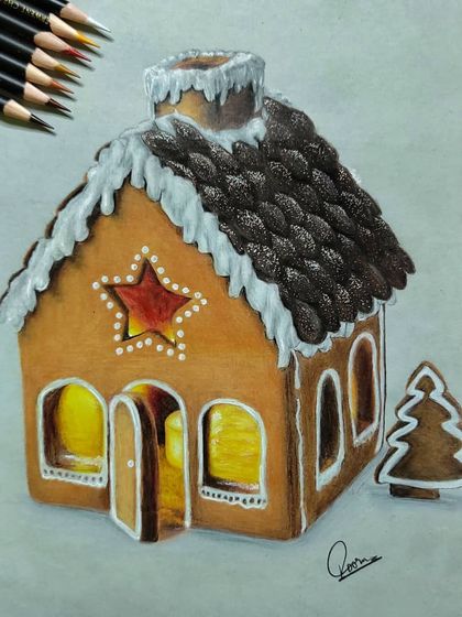 The gingerbread house drawing shown with the pencils used for the roof and walls.