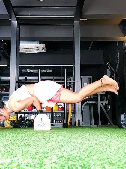 Ending a session with Mayurasana, or peacock pose. This powerful arm balance strengthens the digestive system and tones the entire body.