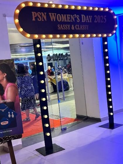 Another view of the marquee entrance sign, showing how we use lighting to create ambiance. The blue uplighting complements the warm marquee bulbs for a dynamic visual effect.