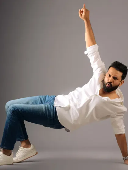 Another high-energy shot that looks like a dance move. The hair and makeup are designed to stay put and look great even during movement.