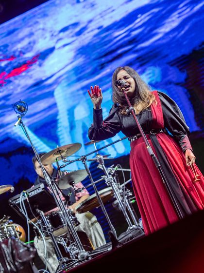 A powerful shot from my performance at Jazz Al Parque, with the drums in the background. This captures the dynamic blend of traditional Indian vocals with a contemporary rhythm section.