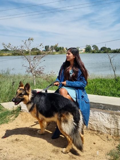 Just a girl and her German Shepherd. This picture captures the heart of my brand. It's all built on the love and partnership I have with Spartan.