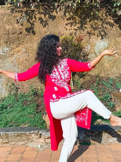 A dynamic semi-classical pose captured in Coorg. The movement in my kurta and the active posture show how this dance form combines the structure of classical with the freedom of contemporary styles.