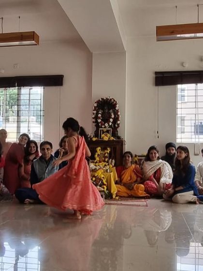A young member of our community dances with joy during our anniversary Puja. The presence of children in our celebrations brings a special lightness and reminds us of the simple happiness of being together.