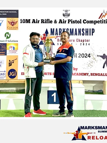 The presentation of the academy trophy at our Marksmanship Summit. We believe in recognizing team effort, and this award celebrates the collective success of the top-performing shooting academy.
