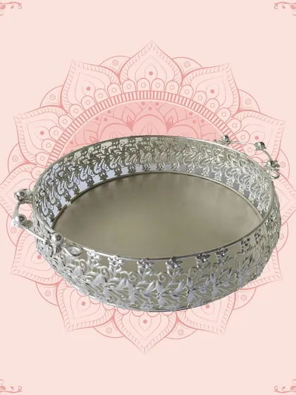 Another one of my beautiful silver-finish trays, this one features a mirrored base and ornate handles. It's perfect for adding a touch of glamour to your festive decor.