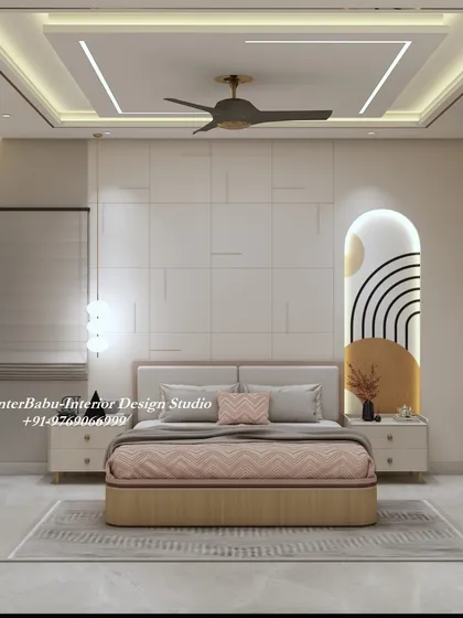 A bedroom that celebrates simplicity and modern art. The headboard wall features a unique abstract niche, while the rest of the room is kept minimal to maintain a calm and uncluttered feel.