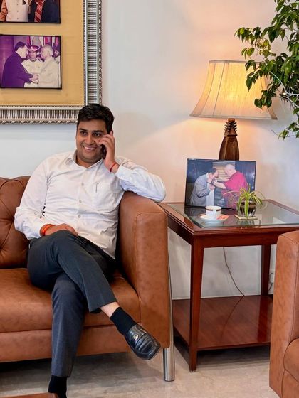 Taking a client call from the seating area in my office. I make it a point to be accessible and keep you updated on the progress of your case.